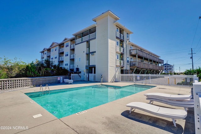 view of pool with a patio