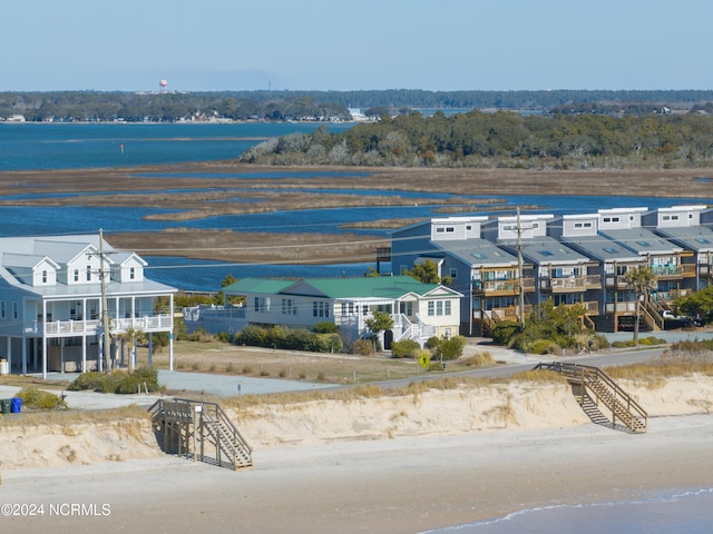 aerial view featuring a beach view and a water view