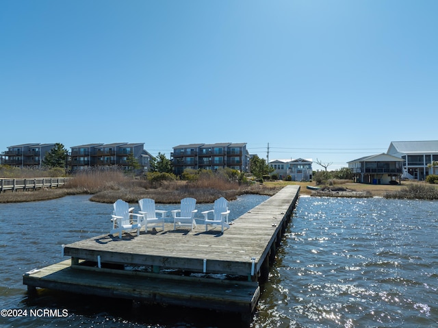 view of dock with a water view