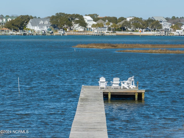 view of dock with a water view