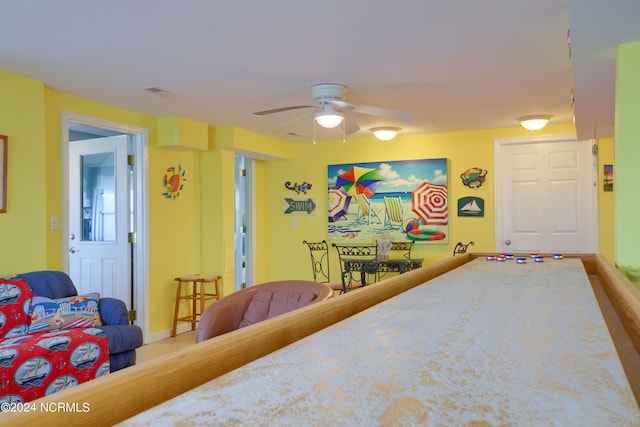 bedroom with wood-type flooring and ceiling fan