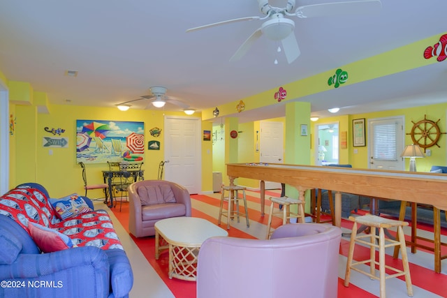 living room featuring ceiling fan