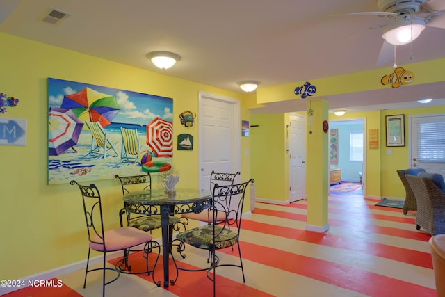 dining space featuring ceiling fan