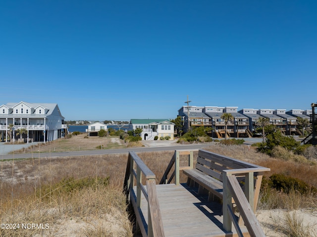 view of home's community featuring a water view