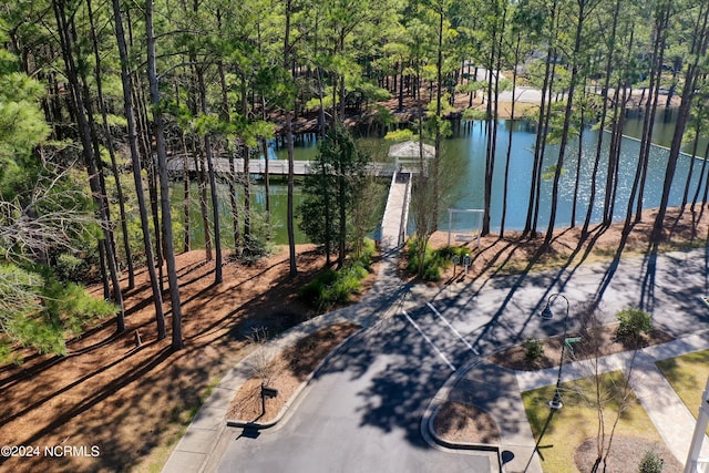 view of patio with a water view