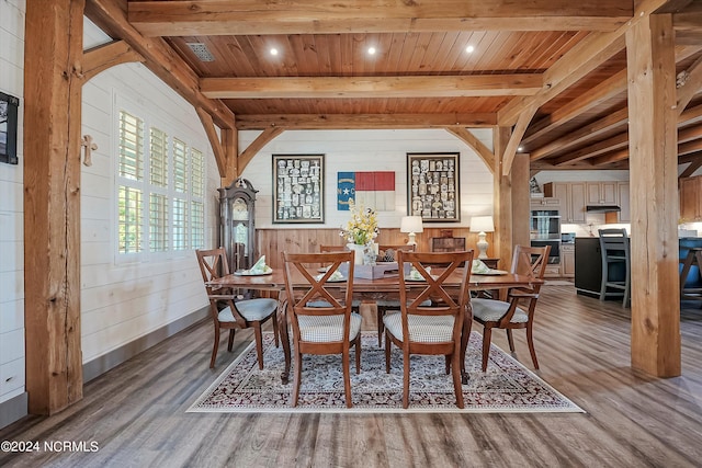 dining room with wooden ceiling, beam ceiling, and wood-type flooring