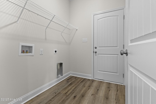 clothes washing area with baseboards, washer hookup, laundry area, wood finished floors, and electric dryer hookup