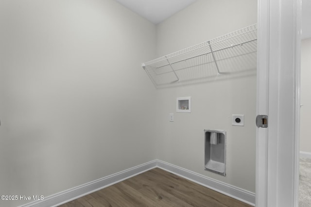 laundry area featuring baseboards, washer hookup, laundry area, electric dryer hookup, and dark wood-style flooring