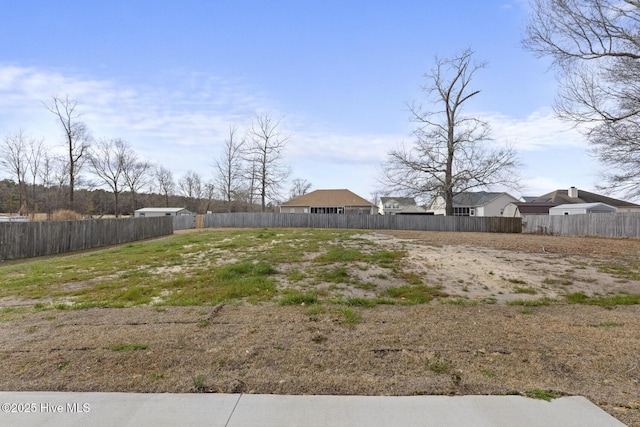 view of yard with fence