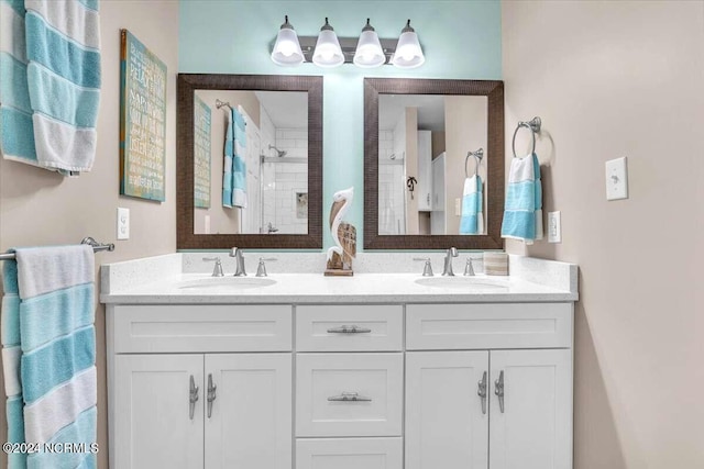 bathroom featuring vanity and a tile shower