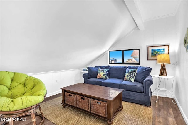 living room featuring lofted ceiling with beams and hardwood / wood-style flooring