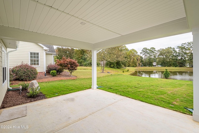 view of patio featuring a water view