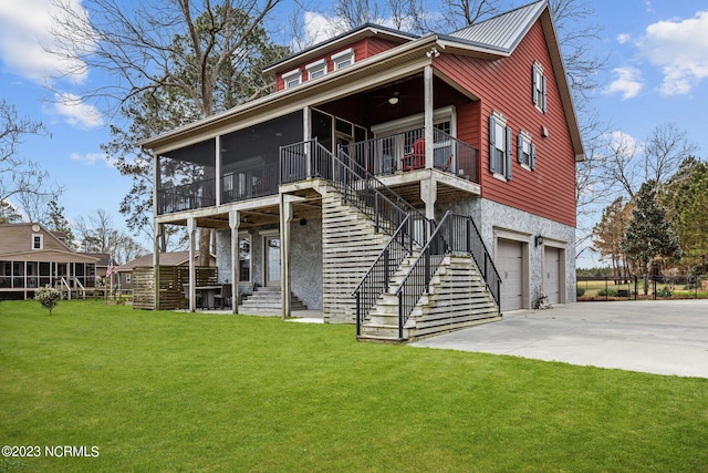 view of front of home featuring a front yard and a garage