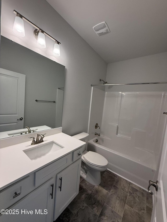 bathroom featuring shower / bath combination, visible vents, toilet, and vanity