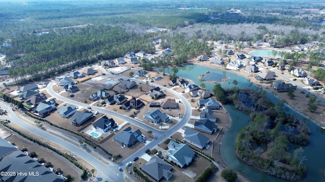 aerial view with a residential view and a water view