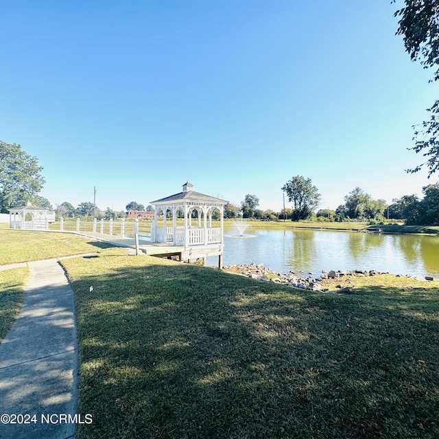 property view of water with a gazebo