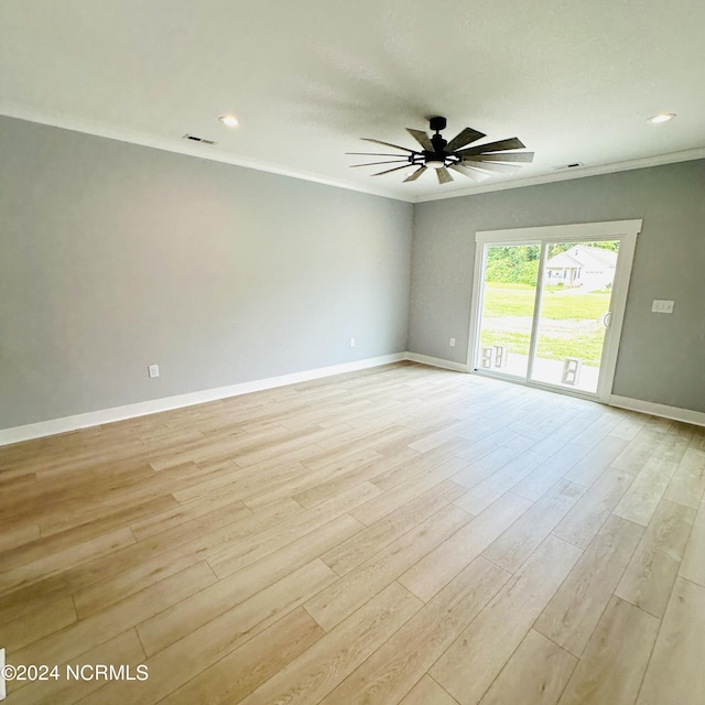 unfurnished room with ornamental molding, light hardwood / wood-style flooring, and ceiling fan