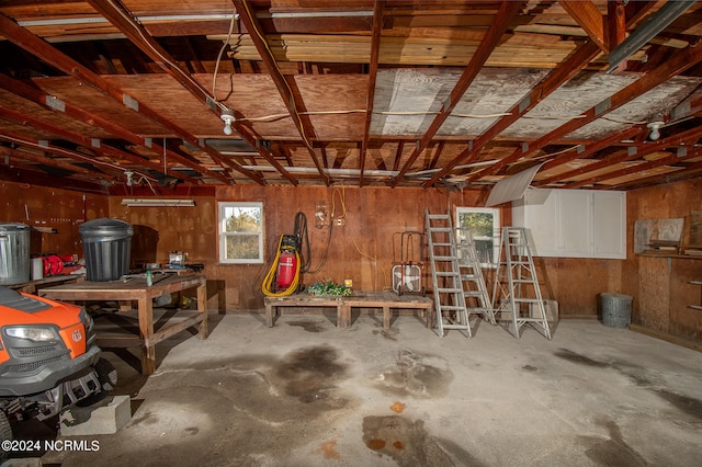 garage with wood walls