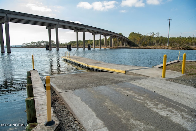 view of dock with a water view