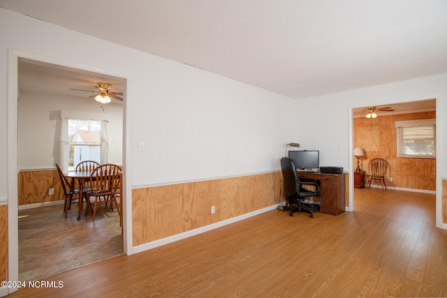 office area featuring wood-type flooring and ceiling fan