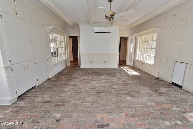 empty room with an AC wall unit and ceiling fan