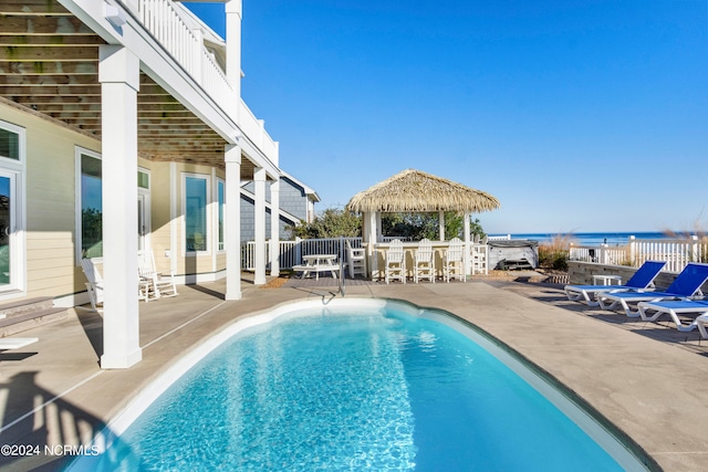 view of pool featuring a gazebo and a patio