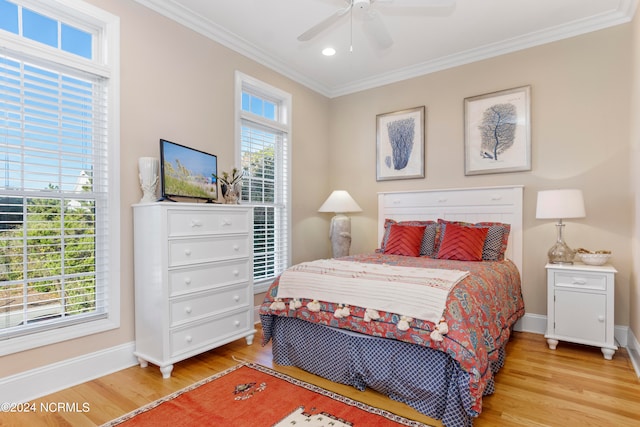 bedroom with ceiling fan, light hardwood / wood-style flooring, and ornamental molding