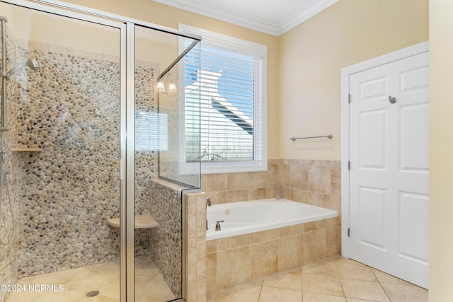 bathroom with ornamental molding, tile flooring, and separate shower and tub