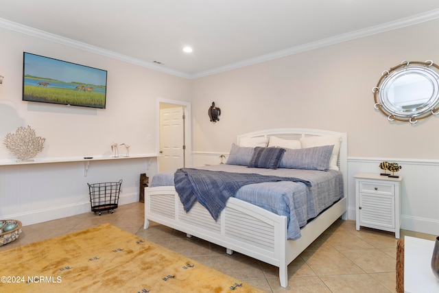 tiled bedroom with ornamental molding