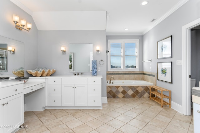 bathroom with tiled bath, crown molding, vanity, and tile flooring