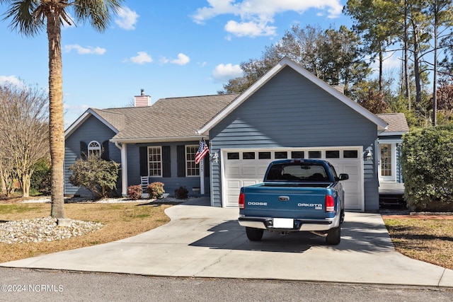 single story home featuring a garage