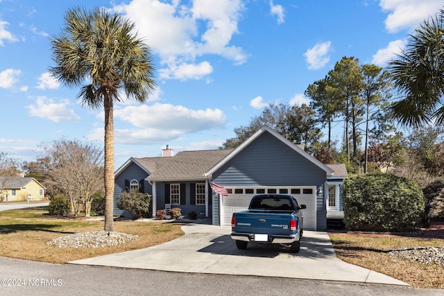 ranch-style home featuring a garage