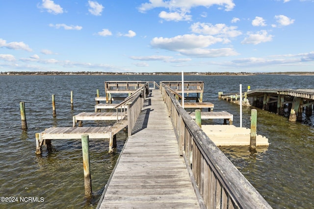 dock area featuring a water view