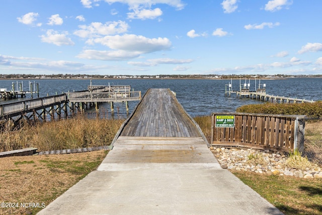 dock area featuring a water view