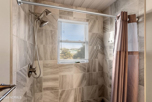 bathroom featuring walk in shower