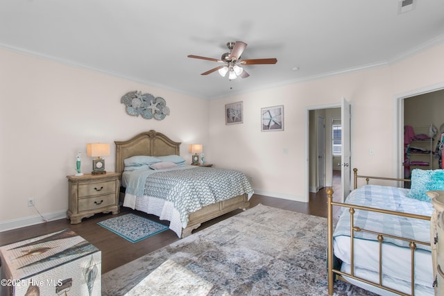 bedroom featuring ceiling fan, baseboards, wood finished floors, visible vents, and ornamental molding