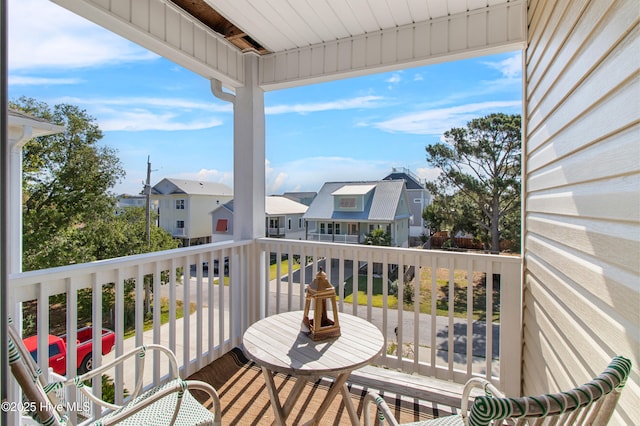 balcony featuring a residential view