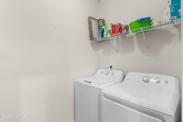 laundry area featuring laundry area and independent washer and dryer