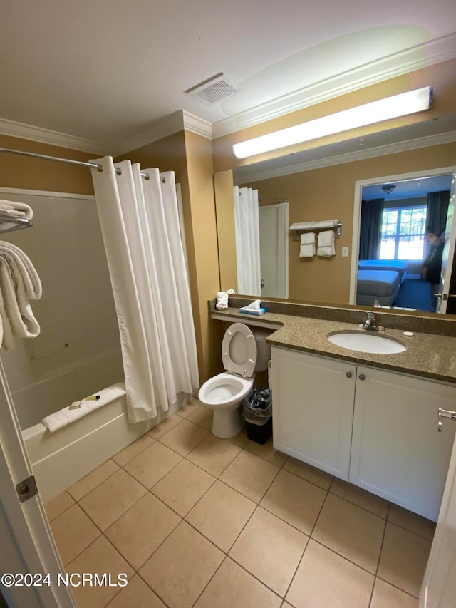 full bathroom featuring crown molding, tile floors, vanity, and shower / bath combo