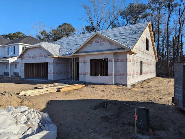 property under construction with a garage