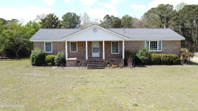 single story home with a front lawn and a porch