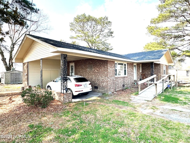 single story home with a carport and a shed