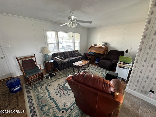 living room with ceiling fan and crown molding