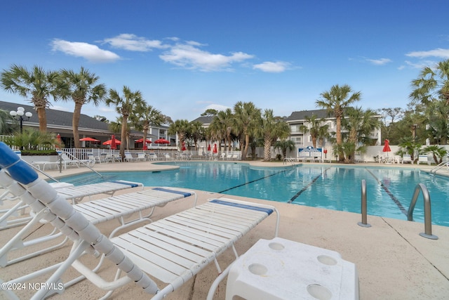 view of pool featuring a patio