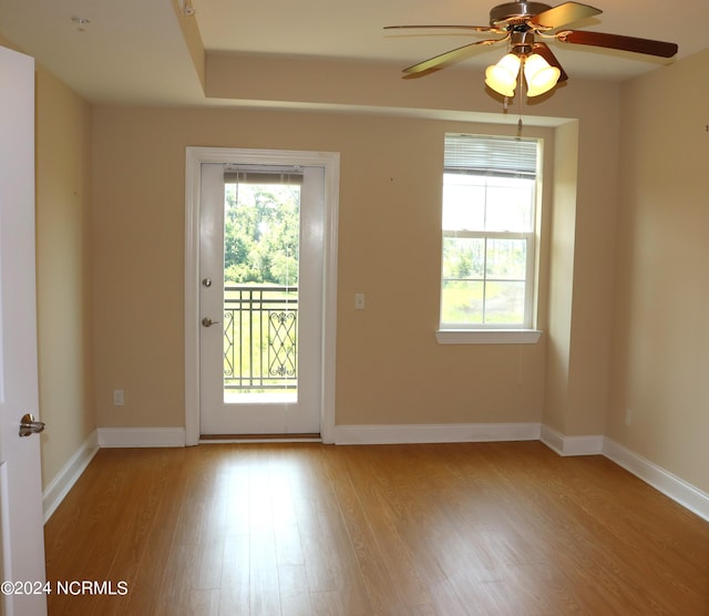 interior space featuring ceiling fan and hardwood / wood-style flooring