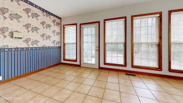 view of tiled spare room