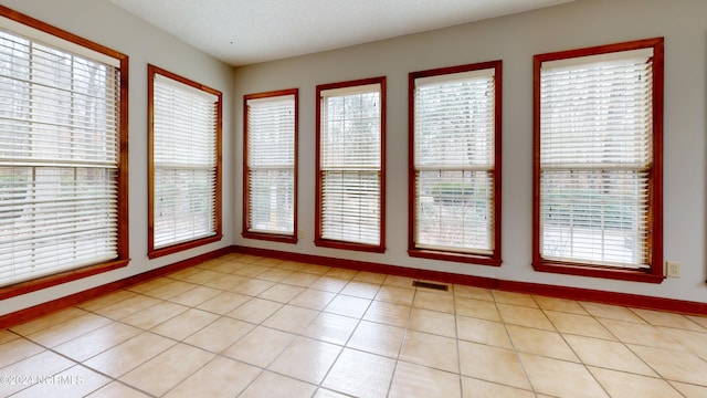 view of tiled empty room