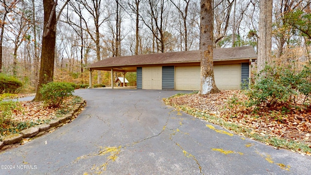 view of home's exterior with a carport