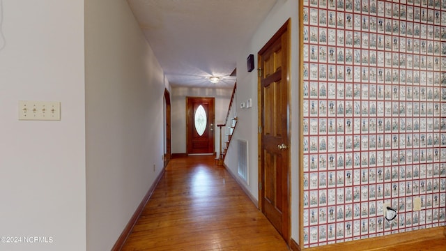 hallway with light wood-type flooring