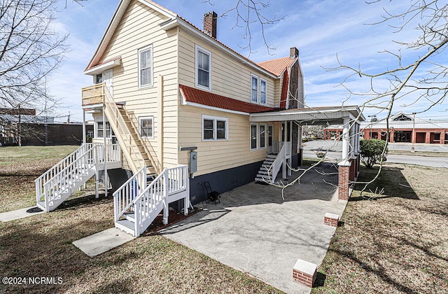 rear view of house with a patio area